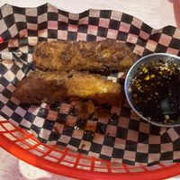 Ate one already - delicious and crispy  at Lucky Pig - Paradise Palms in Edinburgh