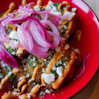 Smashed potatoes - gf, vegan, nut free   at Antojitos Cantina - Paradise Palms in Edinburgh
