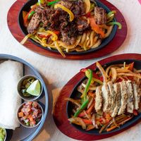 Fajitas: choose from barbacoa seitan or Oaxacan ch*kn - vegan, nut free   at Antojitos Cantina - Paradise Palms in Edinburgh