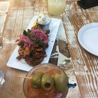 Delicious oyster mushroom calamari with margarita and vegan Caesar  at MeeT in Gastown in Vancouver