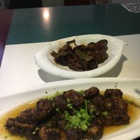 Joyful wheat gluten at the back (very good) and beef with fermented soy beans at the front at Super Vegan - Huang Pu District in Shanghai