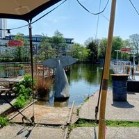 Outside by the water at Cafe De Ceuvel in Amsterdam