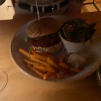 Hardly visible but the homemade burger with sweet potato fries   at Eetcafe Ceramique in Maastricht