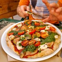 Vegan burrata pizza with pesto at Samelo Veg in Tenerife