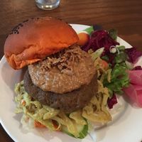 Delicious orange bun burger at Hoezo in Leiden