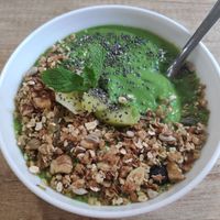 Green smoothie bowl for break fast at BIOrganic Raw Cafe in Chisinau