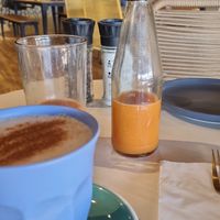 Chai latte with coconut milk and orange ginger carrot juice at The Grind Coffee Company in Johannesburg