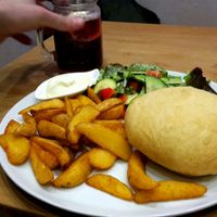 Fried vegan burger with aioli, salad and potatoe wedges at Marla & Mathilda's Genusswerkstatt in Ludenscheid