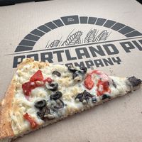 Well done. Black olive, red pepper mushroom in garlic olive oil perfect   at Portland Pie Company in Brunswick