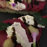 Roasted beet and herb almond ricotta bruschetta  at Double Zero in New York City