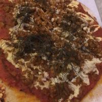 Fennel farro sausage with tomato cashew mozzarella on gluten free crust at Double Zero in New York City