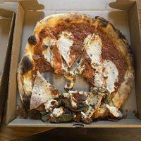 Pepperoni - driver delivered the pizza in a backpack vertically   at Double Zero in New York City