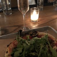 Sparkling Rose and Eggplant Bacon Pizza at the bar. Yummmmm at Double Zero in New York City