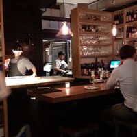 Kitchen and serving area with bar at Double Zero in New York City