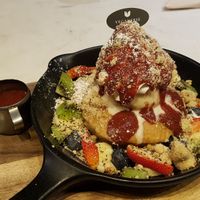 Pancakes, fruits and vanilla ice cream at Veganerie Concept - Benjasiri Park in Bangkok