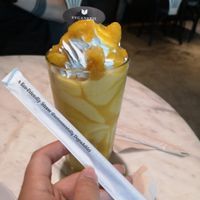 Mango smoothie & bio degradable straws! at Veganerie Concept - Benjasiri Park in Bangkok