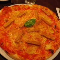 Chickn Curry Pizza with Banana Slices at Feca in Stockholm