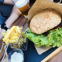 huge ‘beef’ burger with fries at Plantaz Bistro & LimeLight BAR in Martin