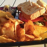 Falafel sandwich, cabbage slaw, housemade chips at Local Foods - The Village in Houston