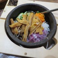 Dolsot Bibimbap Tofu (vegan) - basically the same as 'Jabchae Tofu', but served in a hot stone bowl so it keeps cooking  at Kimdogo in Saarbrucken