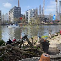 Sitting by the river  at The Green Market Berlin in Berlin