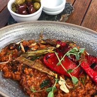 Roasted Capsicum Risotto with a side of olives  at Postmasters in Arrowtown