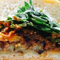 Eggplant panini with cashew ricotta and marinara. Delicious!  at Gratitude in Newport Beach