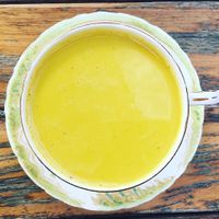 Golden turmeric latte with soy milk  at Ground Earth in Woolgoolga