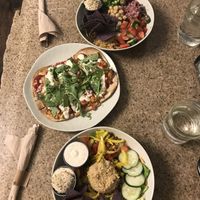 Up - Mediterranean bowl with hummus & chips on the side - BBQ Cauliflower Flatbread - Chickpea of the Sea blowl with hummus & chips on the side.  at Dandelion Community Cafe in Orlando