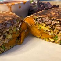 Sweet potato burrito with chili 🥰 at Dandelion Community Cafe in Orlando