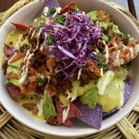 Starter nachos that I wish had a little more toppings, maybe beans  at La Pitahaya Vegana in Mexico City