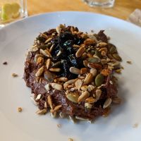 Chocolate mousse with seed brittle and cherries at Cafe Van Gogh in South West London