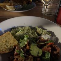 Delicious chilli, green rice, corn bread, guacamole   at Cafe Van Gogh in South West London