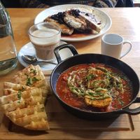 Front: shakshuka: back: french toast. And coffee at Cafe Van Gogh in South West London