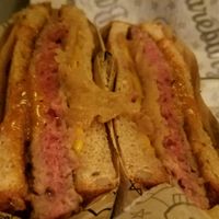 Impossible Melt sandwich - Impossible burger with vegan cheese, caramelized onions and special sauce at Bareburger in Hartsdale
