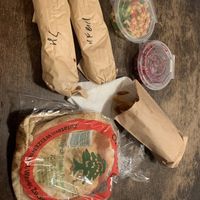 Chickpea-Salad, Feetroot-Salad, 2x Harissa-Falafel-Wraps, Fries, the bread is served to every Salad  at Habeez - Rüttenscheid in Essen