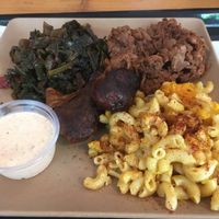 BBQ tray with drumsticks, mac n cheese, and collard greens at Choices Cafe in Miami