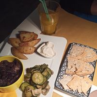 Mix di contorni, pane e estratto di frutta at OrtoZero Cafe in Alessandria