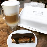 A snickers bar and a delicious cappuccino prepared right at Vegamo Centro in Mexico City