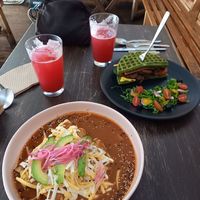 Enjrijoladas and Waffle Burger Chewbacca with limonada fresca at Vegamo Centro in Mexico City
