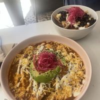 top: chilaquiles     bottom: enfrijoladas  at Vegamo Centro in Mexico City