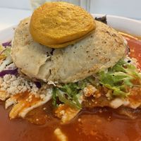 Red enchiladas with a “fried egg"  at Vegamo Centro in Mexico City
