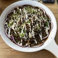 Enchiladas with mole sauce ❤️  at Vegamo Centro in Mexico City