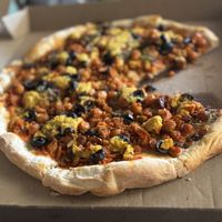 Chickpea chorizo pizza. The yellow stuff is a nut cheese. It was creamy.   at Vegamo Centro in Mexico City