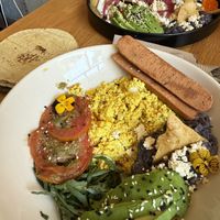 Below: Tofu a la mexicana / Above: Chilaquiles verdes  at Vegamo Centro in Mexico City