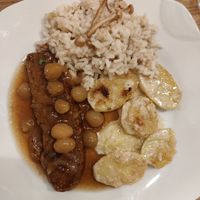 Rôti de seitan, gratin dauphinois et risotto aux champignons at Slurps in Brussels