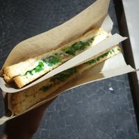 Veg Toast, with chickpeas hummus, mushrooms, rocket, vegan cheese, sesame seeds at Capatoast in Naples