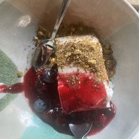  Coconut pudding with cherry sauce and pistachio    at Kanaan in Berlin