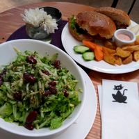 Burger and salad (vegan on request) at Dit e Nat in Pristina