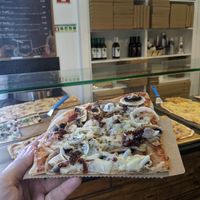 vegan pizza in slices! at Hand Go in Porto